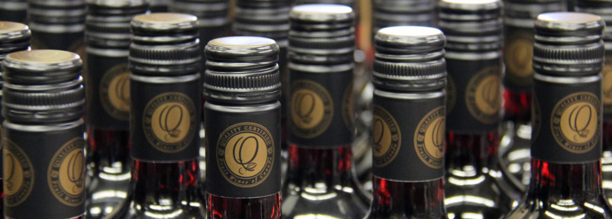 wine bottle tops covered with quality certified capsules