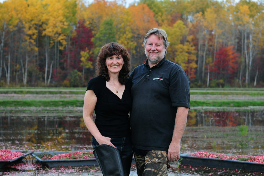 Murray Johnston & Wendy Hogarth in hip waders at harvest time