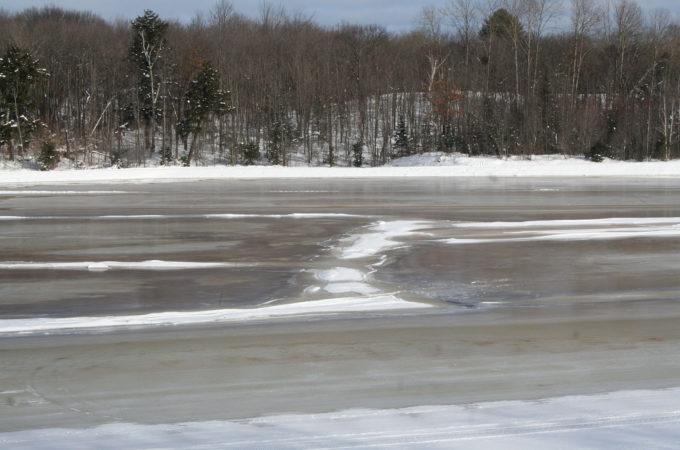 Flooded cranberry beds frozen to ice at Johnston's Cranberry Marsh & Muskoka Lakes Winery