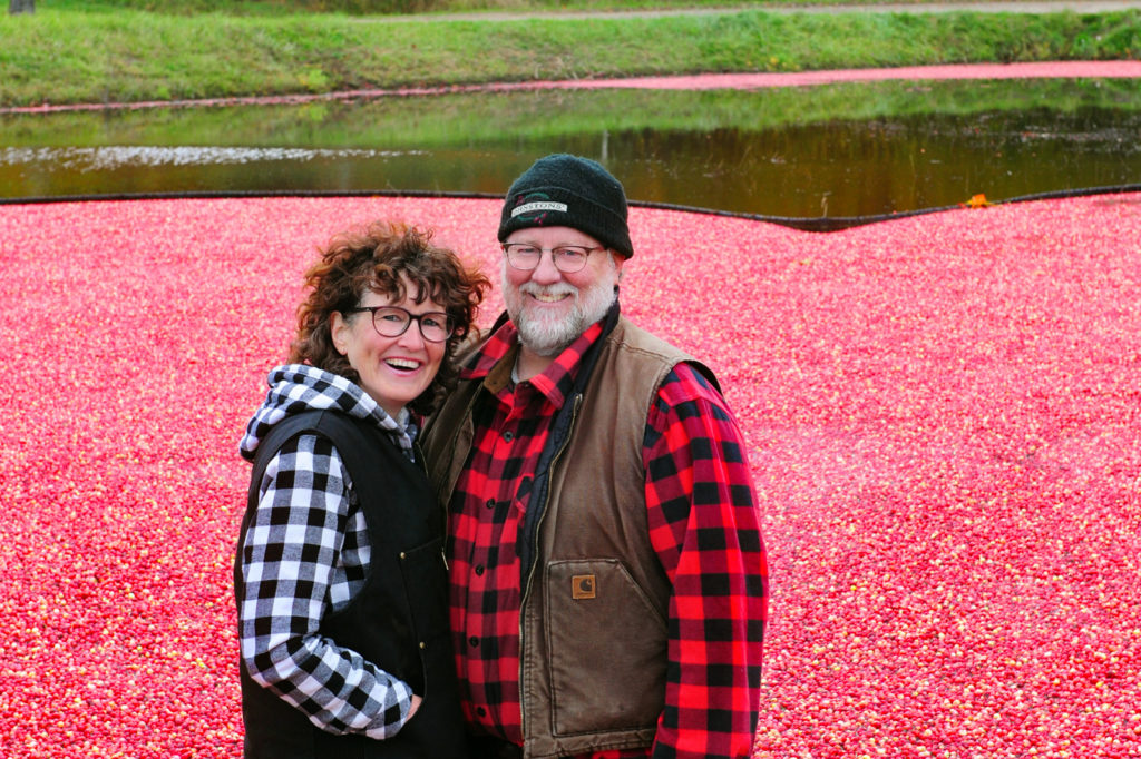 wendy hogarth and murray johnston in the cranberry plunge at muskoka lakes farm and winery