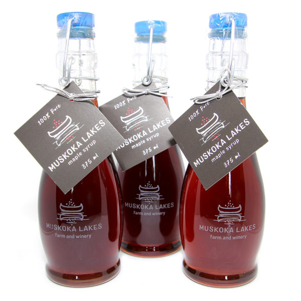 three bottles of muskoka lakes maple syrup