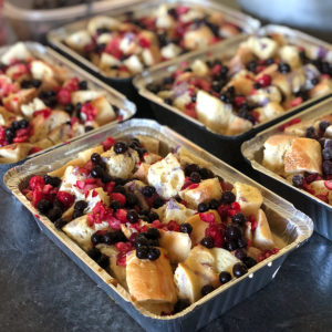 preparing cranberry blueberry french toast bake