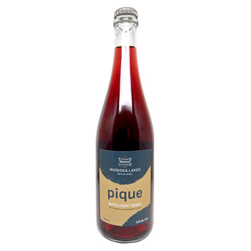 bottle of pique blueberry bottle craft cider from muskoka lakes farm & winery