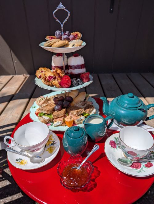 a demonstration of a fully prepared cranberry afternoon tea for two.